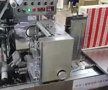 Cigarette pack machine